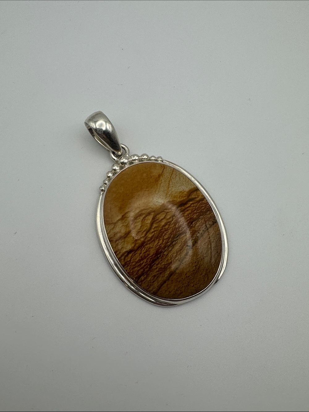 Brown Jasper Oval Pendant in Sterling Silver Setting